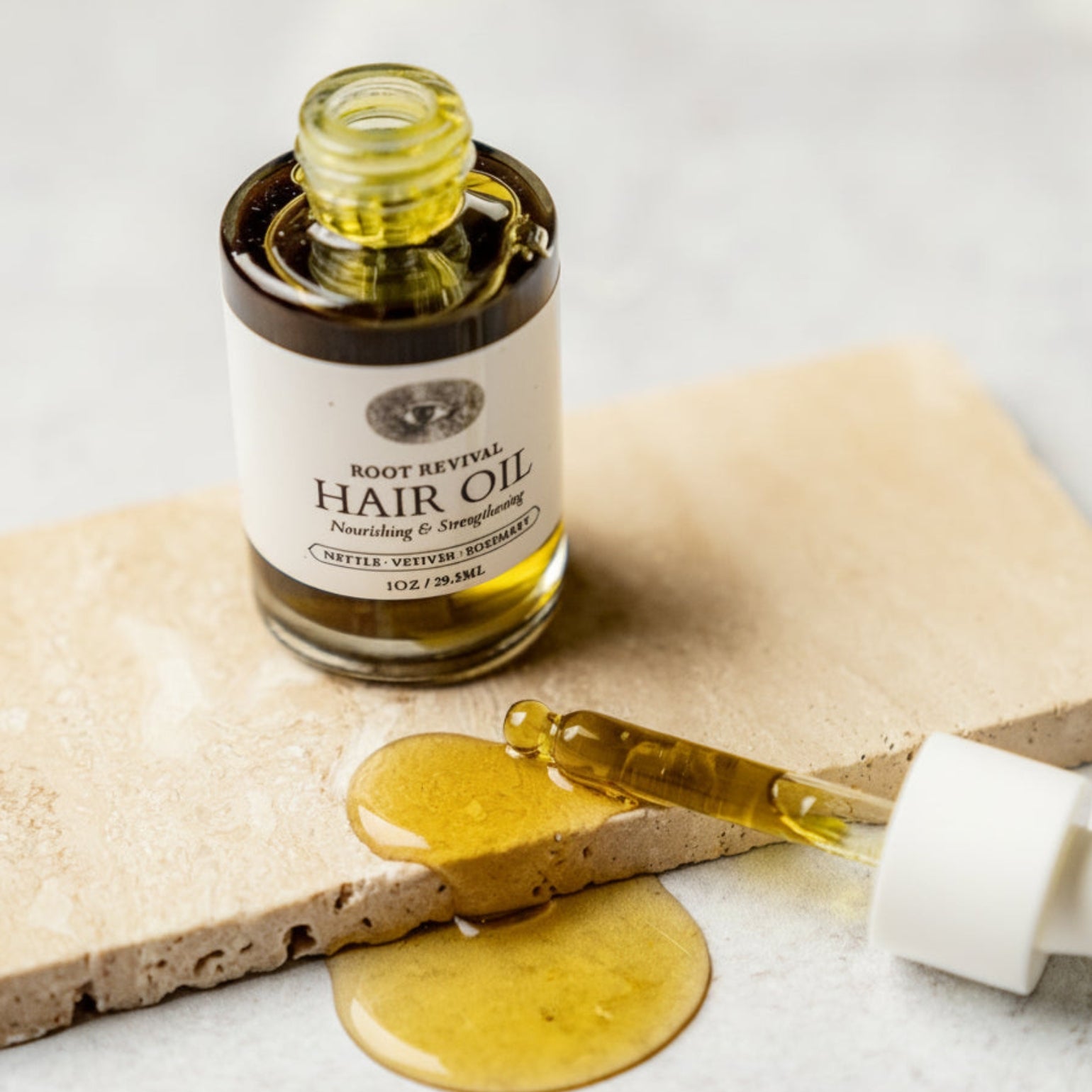 Huile Capillaire Root Revival de Anima Mundi. Flacon compte-gouttes. Huile nourrissante et revitalisante pour la pousse des cheveux.